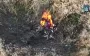 Body of Russian invader engulfed in flames after attack by Ukrainian strike drone. VIDEO