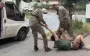 In Lviv, men in uniforms with AFU insignia dragged guy out of entrance, dragged him along asphalt and shoved him into minibus. VIDEO