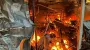 Russians hit Velykyi Burluk in Kharkiv Oblast with drones: market on fire, woman injured – photos
