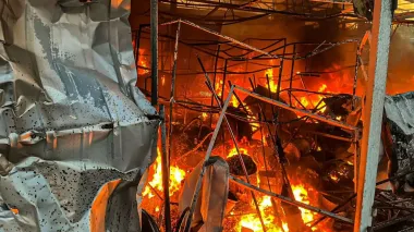 Russians hit Velykyi Burluk in Kharkiv Oblast with drones: market on fire, woman injured – photos