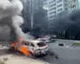 Shocked Ukrainians leave apartment block after Russian bomb hits Kharkiv – video