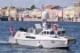 Russia scales down celebrations honoring its navy as Ukraine launches more drone attacks