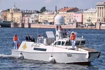 Russia scales down celebrations honoring its navy as Ukraine launches more drone attacks