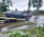 Не преодолел водную преграду: в Киеве в непогоду утопили дорогой Porsche (фото, видео)