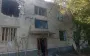 Russian troops attacked Dudchany in Kherson region with drones: multi-storey building was damaged. PHOTOS