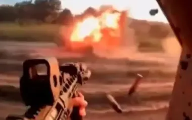 Soldiers fire automatic weapons at Russian "Zhdun" drone sitting in ambush on road and destroy it. VIDEO