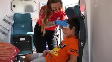 Ukrainian Red Cross volunteers welcome evacuation train in Mukachevo