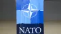 Trump says US may offer some security guarantees to Ukraine, but not through NATO