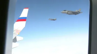 Kremlin video shows US fighter jets escorting Putin from Alaska – video