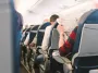 Расправа в воздухе: пассажир отреагировал на кражу с верхней полки (видео)