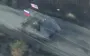 Occupiers hung Russian and American flags on their armoured vehicle and are heading to storm positions of Armed Forces of Ukraine. VIDEO