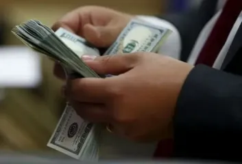 Как отличить фальшивую 100-долларовую купюру: три главных признака