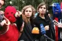 Russia sentences Pussy Riot members in absentia to jail for anti-war messages 