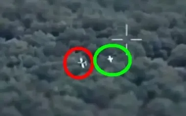 Reconnaissance drone films Ukrainian anti-aircraft drone attacking Russian "Lancet" strike UAV. VIDEO