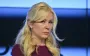 Блогеры, кремлевский историк и "любовница" Путина: кто попал под новые санкции Украины