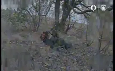 Ukrainian drone strikes occupier "relieving himself" in tree line. VIDEO