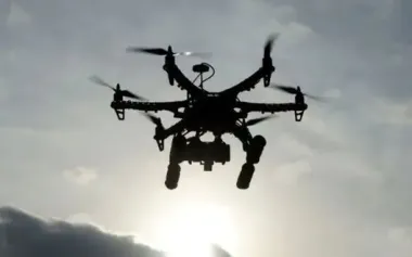 Russians attack car with drone in Kharkiv region: settlement head and community secretary injured