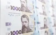 На гривнях пропонують розмістити напис Ми віримо в Бога