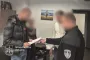 В Киеве полицейские избили мужчину возле Голосеевского РТЦК: появилось видео