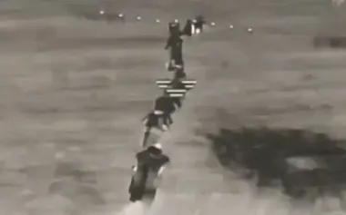 Ukrainian drone flies into assault group of ten occupiers wearing anti-thermal ponchos. VIDEO
