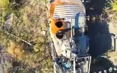 Occupier hid in tank: strike drones dropped ammunition directly into open hatch. VIDEO