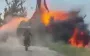 Russian motorised assault trooper watches as armoured vehicle with accomplices disappears in flames after hitting mine. VIDEO